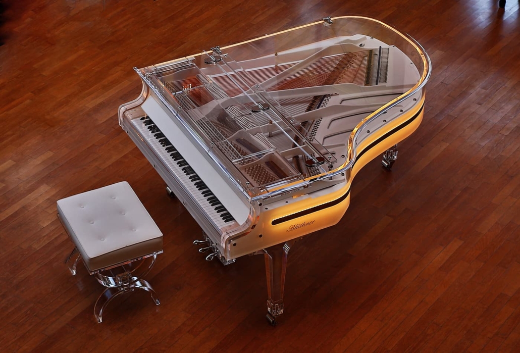 Photo of a uniquely designed piano from above. Grand piano.