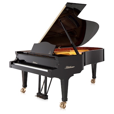 Image of a Bluthner grand piano.